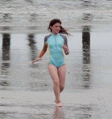 Bree running on beach